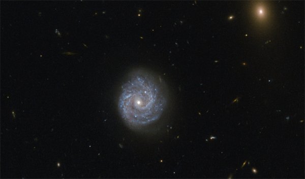 Фото дня: загадочная чёрная дыра в «сердце» спиральной галактики - «Новости сети»
